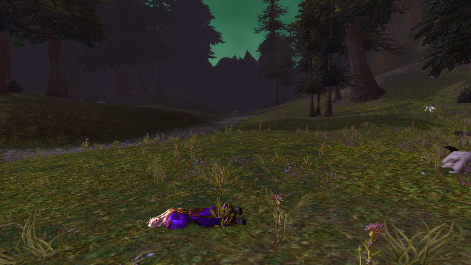 Thrïïr lies dead on a hillside in Tirisfal Glades