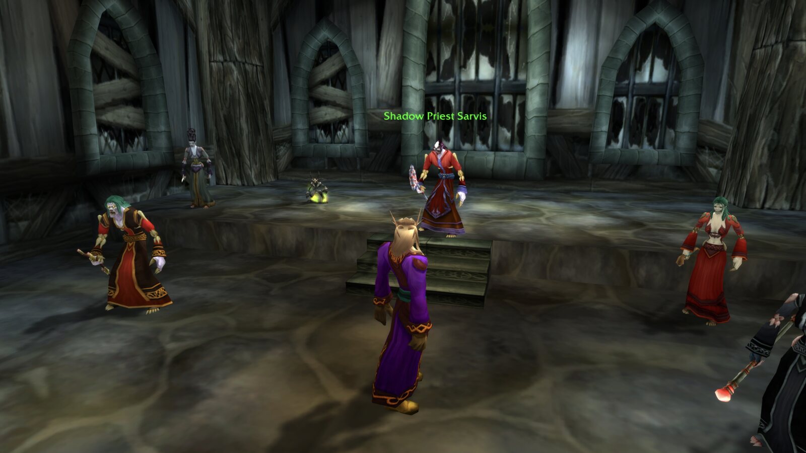 Thrïïr stands in Deathknell chapel before Shadow Priest Sarvis and the Forsaken initiates